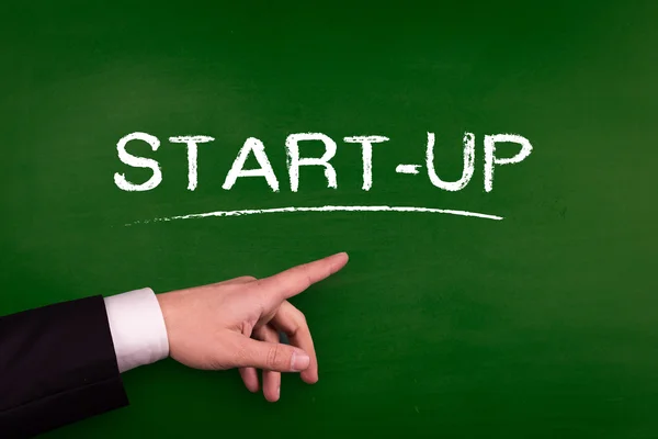 Businessman pointing on start up