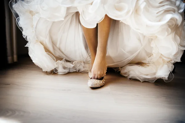 Morning bride dresses wedding shoes close up