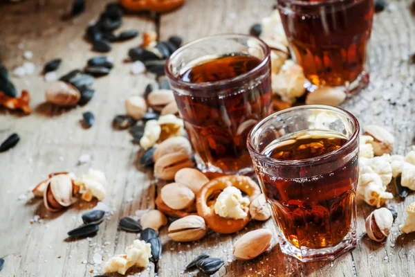 Cola glasses, sweet and savory snacks