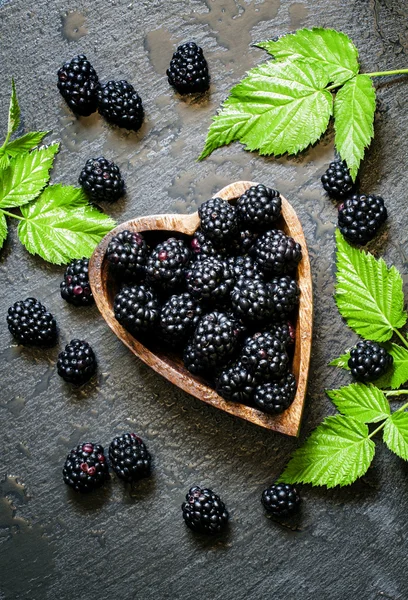 Blackberries in bowl in the shape of a heart