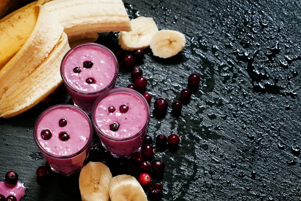 Cranberry-banana smoothie with yogurt and berries