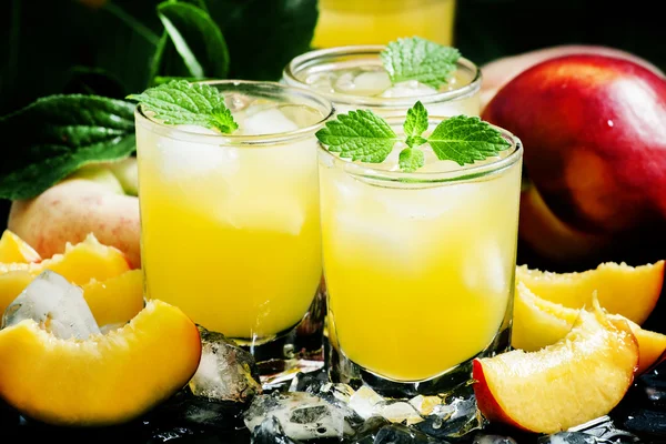 Cool summer peach juice with crushed ice
