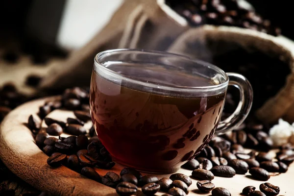 Hot espresso coffee in a glass cup