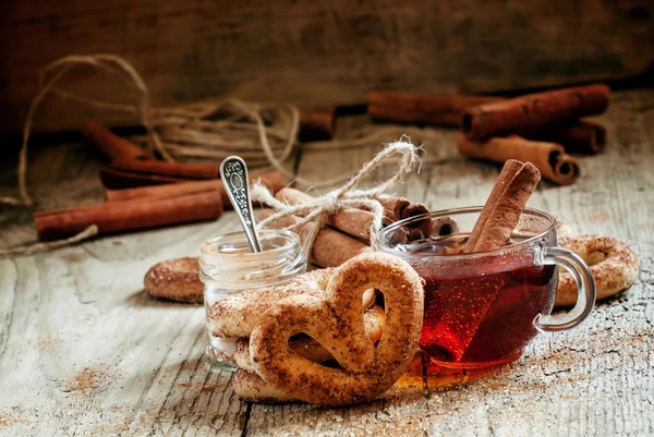 Black tea and cookies with cinnamon