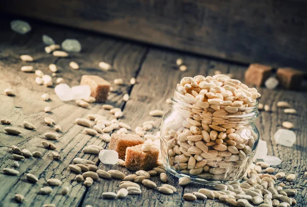 Sweet puffed rice with caramel in a glass jar