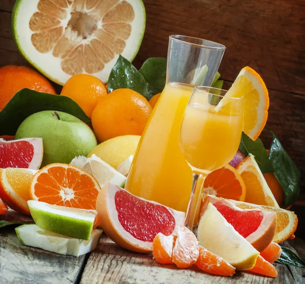 Freshly squeezed citrus juice with pulp and fruit pieces