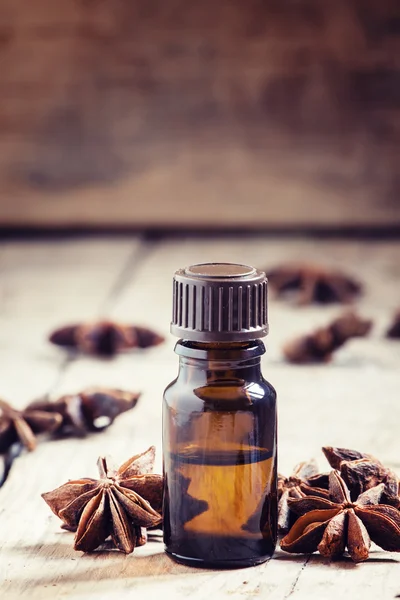 Essential oil of anise in a small brown bottle