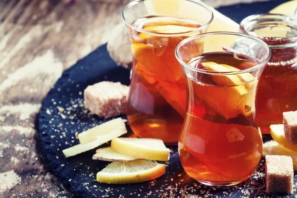 Black hot tea with honey, lemon and cane brown sugar