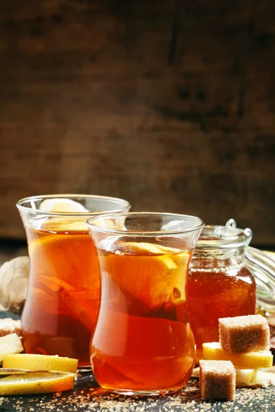 Black hot tea with honey, lemon and cane brown sugar