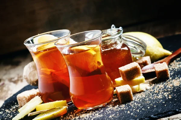 Black hot tea with honey, lemon and cane brown sugar