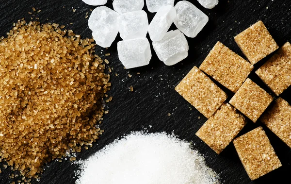 Assortment of sugar: white sand, candy sugar, brown sugar