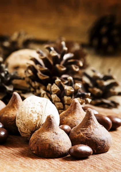 Fir cones, nuts, chocolate truffles