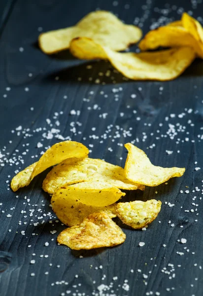 Potato chips and sprinkled salt