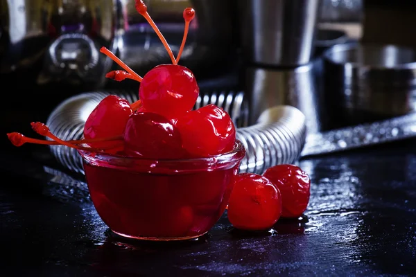 Bar tools and maraschino cherries