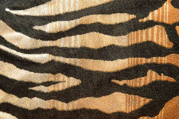 Fabric with tiger stripes pattern background