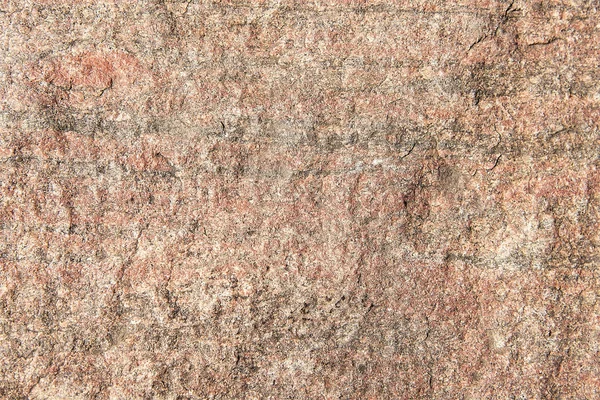 Red granite rock background texture