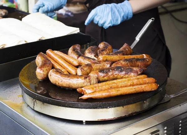 Street food, sausages on grill