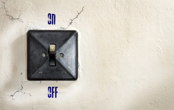 Old wall-mounted light switch