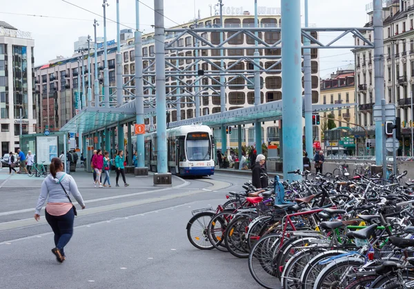 Geneva, Switzerland - June 17, 2016: The city tram and bicycles on the street