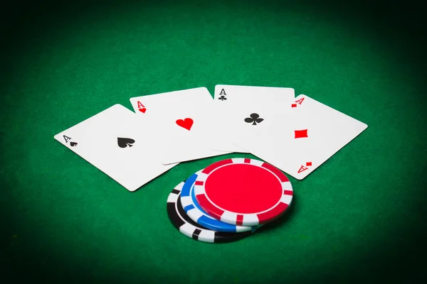 Poker cloth, a deck of cards and chips