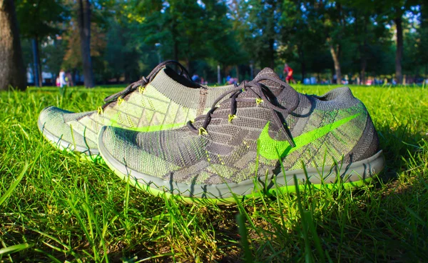 Dnipropetrovsk, Ukraine - August, 21 2016: New style nike shoes on green grass - illustrative editorial