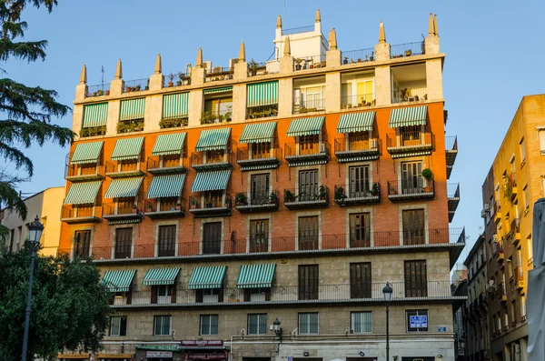 Orange brick and sandstone building in sunlight in Valencia, Spain