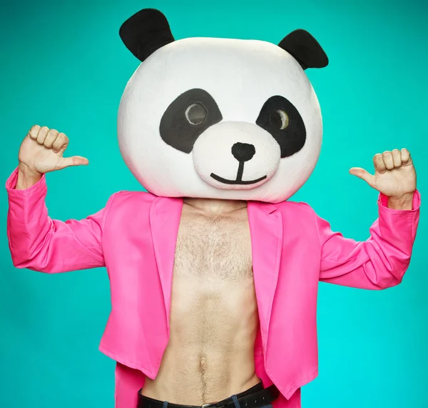 The guy in pink tailcoat with panda head.