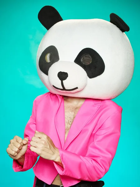 The guy in pink tailcoat with panda head.