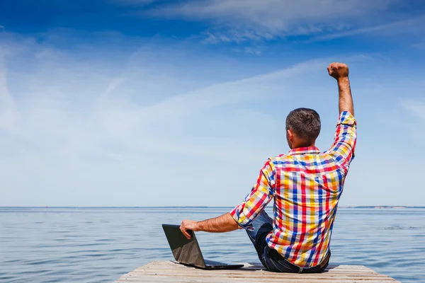 Young man with laptop