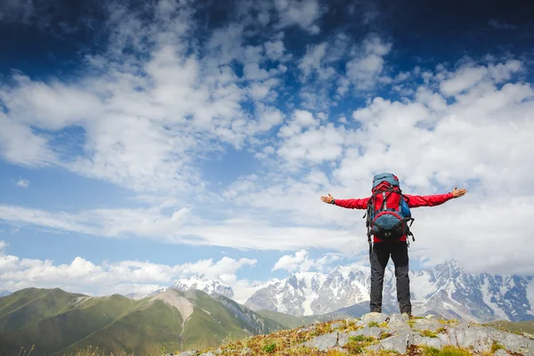 Man standing with hands outstretched