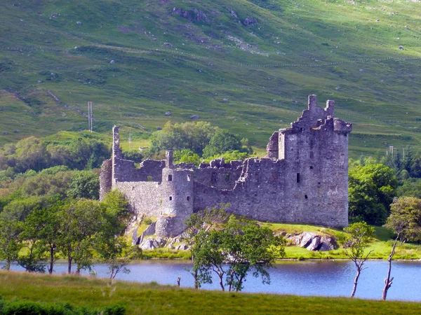 A historic Scottish Castle, Kilchurn Castle on a summer day in Scotland