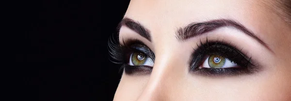 Woman eyes with evening makeup