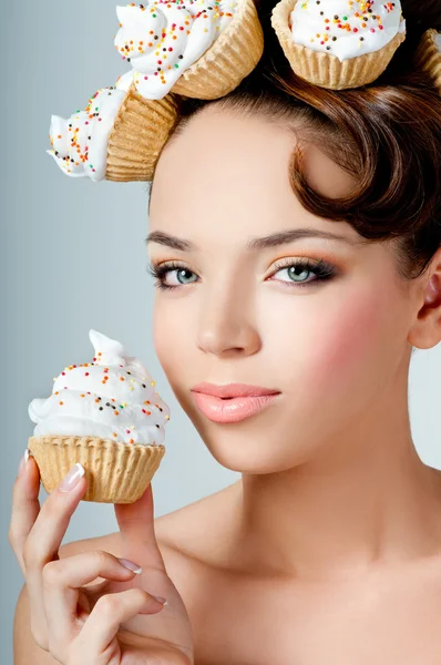 Beautiful girl eating cake