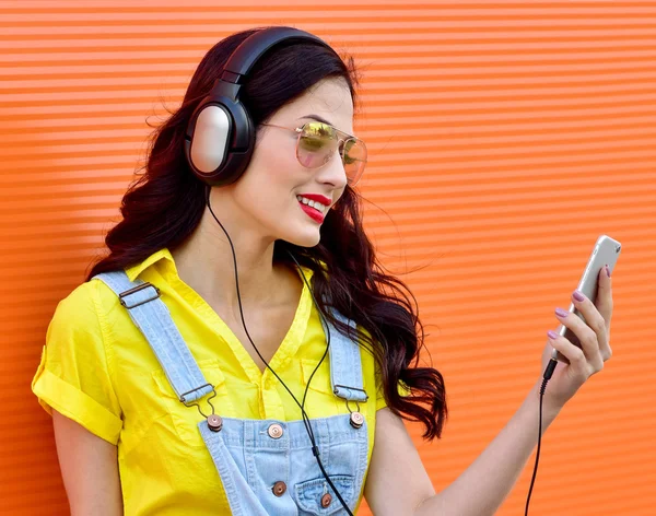 Beautiful smiling woman with headphones