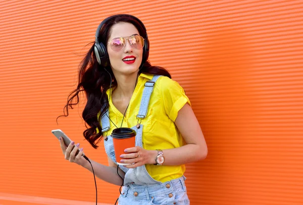 Beautiful smiling woman with headphones