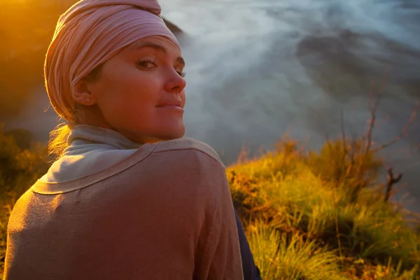 Portrait Young Pretty Girl Sunrise Mountains.Africa Nature Morning Volcano Viewpoint.Mountain Trekking,View Landscape.Woman Engaged Yoga Meditation.Horizontal picture.First Rays Rising Sun.