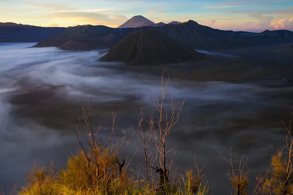 Sunrise Mountains.Asia Nature Morning Volcano Viewpoint.Mountain Trekking, Valley View Landscape . Nobody photo. Horizontal picture. The first rays of the rising sun.