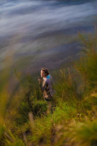 Image Young Pretty Girl Sunrise Mountains Forest.Africa Nature Morning Volcano Viewpoint.Mountain Trekking,View Landscape.Woman Traveler.Vertical Picture.First Rays Rising Sun.White Fog Background.
