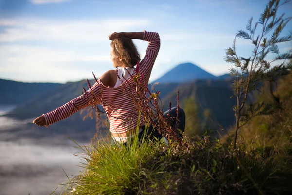 Portrait Young Pretty Girl Sunrise Landscape.Africa Nature Morning Volcano Viewpoint.Woman Engaged Yoga Meditation Mountains Dawn.Mountain Trekking.Horizontal picture.First Rays Rising Sun.
