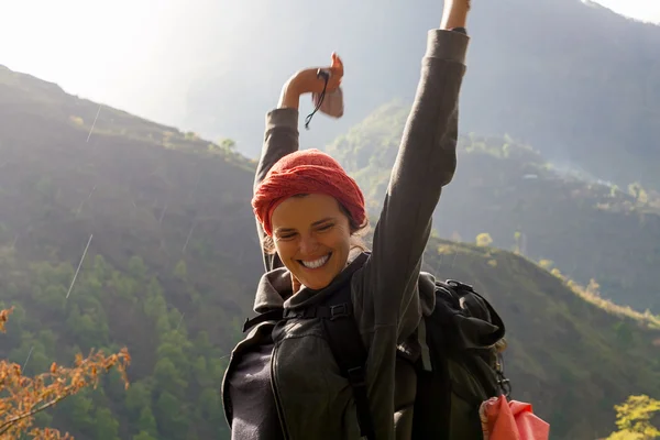 Portrait Young Pretty Girl Sunrise Rain Mountains.Africa Nature Morning Volcano Viewpoint.Mountain Trekking,View Landscape.Woman Happy Smiling.Horizontal picture.First Rays Rising Sun.