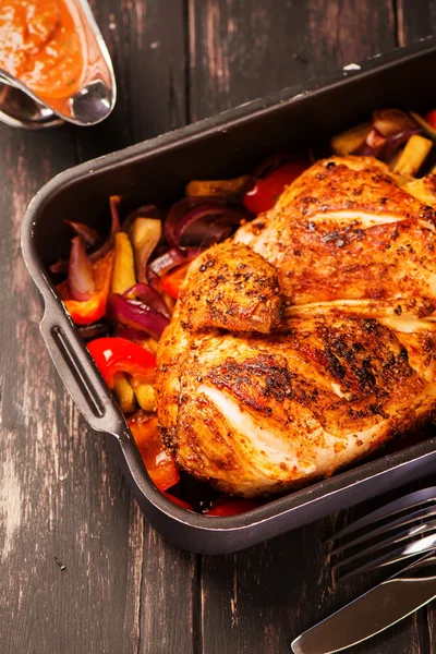 Grilled chicken with baked vegetables