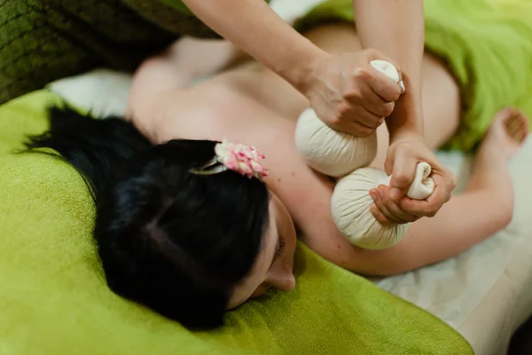 Thai herbal hot pack massage