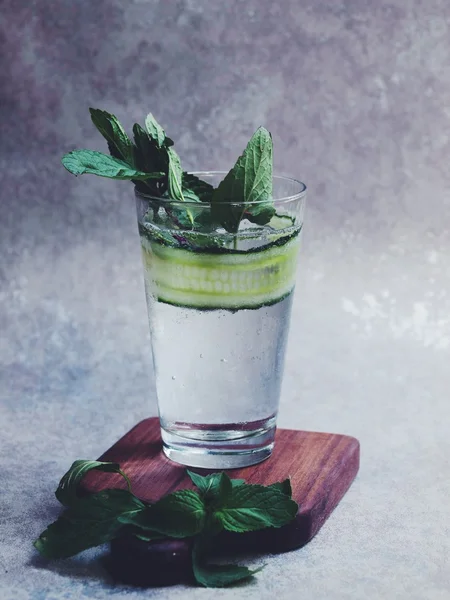 Cold cucumber mint ice soda drinking