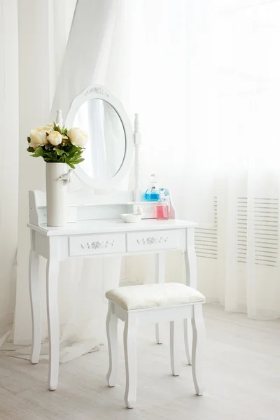 White dressing table in bathroom