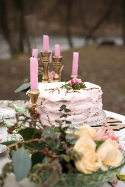 Wedding table in the woods. accessories at the wedding table. Close-up