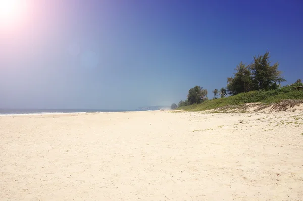 Empty beach, sea, sun, sky and sand