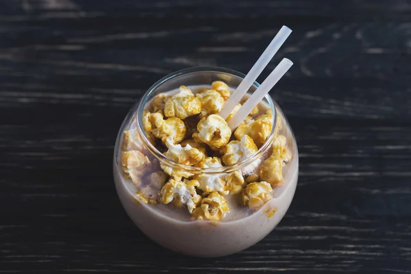 Cup of cacao with caramel popcorn