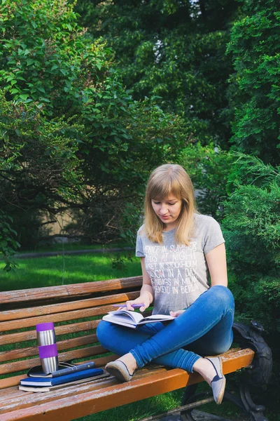 Student studying in park