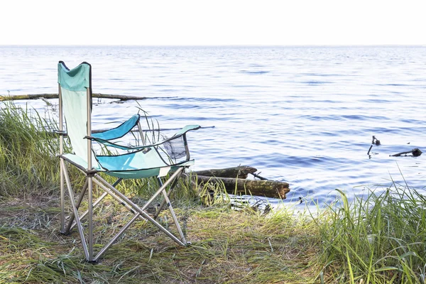 Camping place with armchairs near the sea