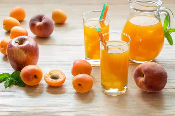 Apricot peach apple juice with ice.